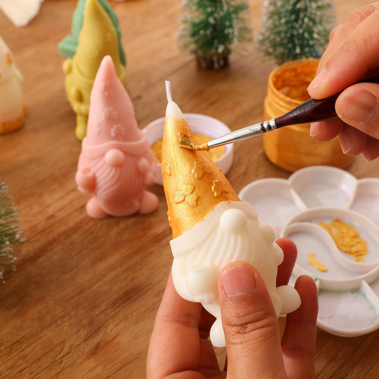 Apply golden mica pink to the Christmas Floral Hat Gnome Candle - Boowan Nicole