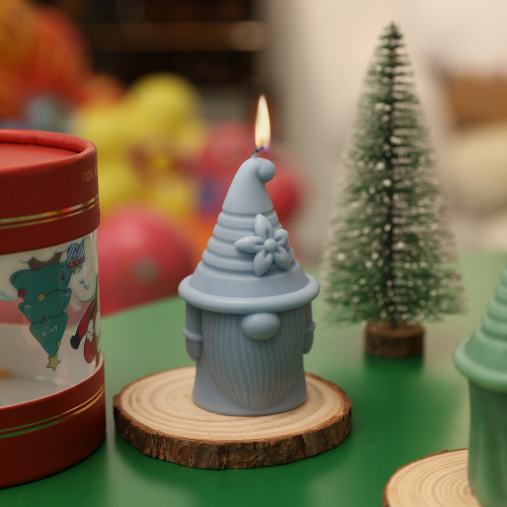 Light up the blue Florian of Hat-tastic Gnome Squad Candle -Boowan Nicole