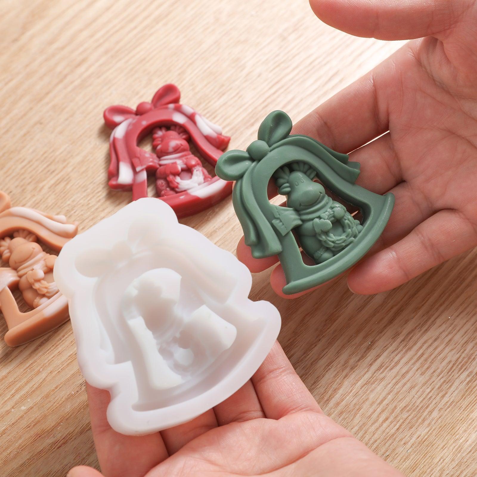 Green Bambi candle jar decoration and white silicone mold shown in hand - Boowan Nicole