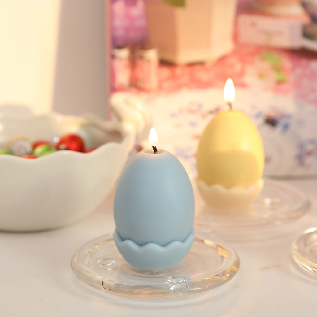 Two lit Easter eggs with eggshell candles, creating a festive ambiance.