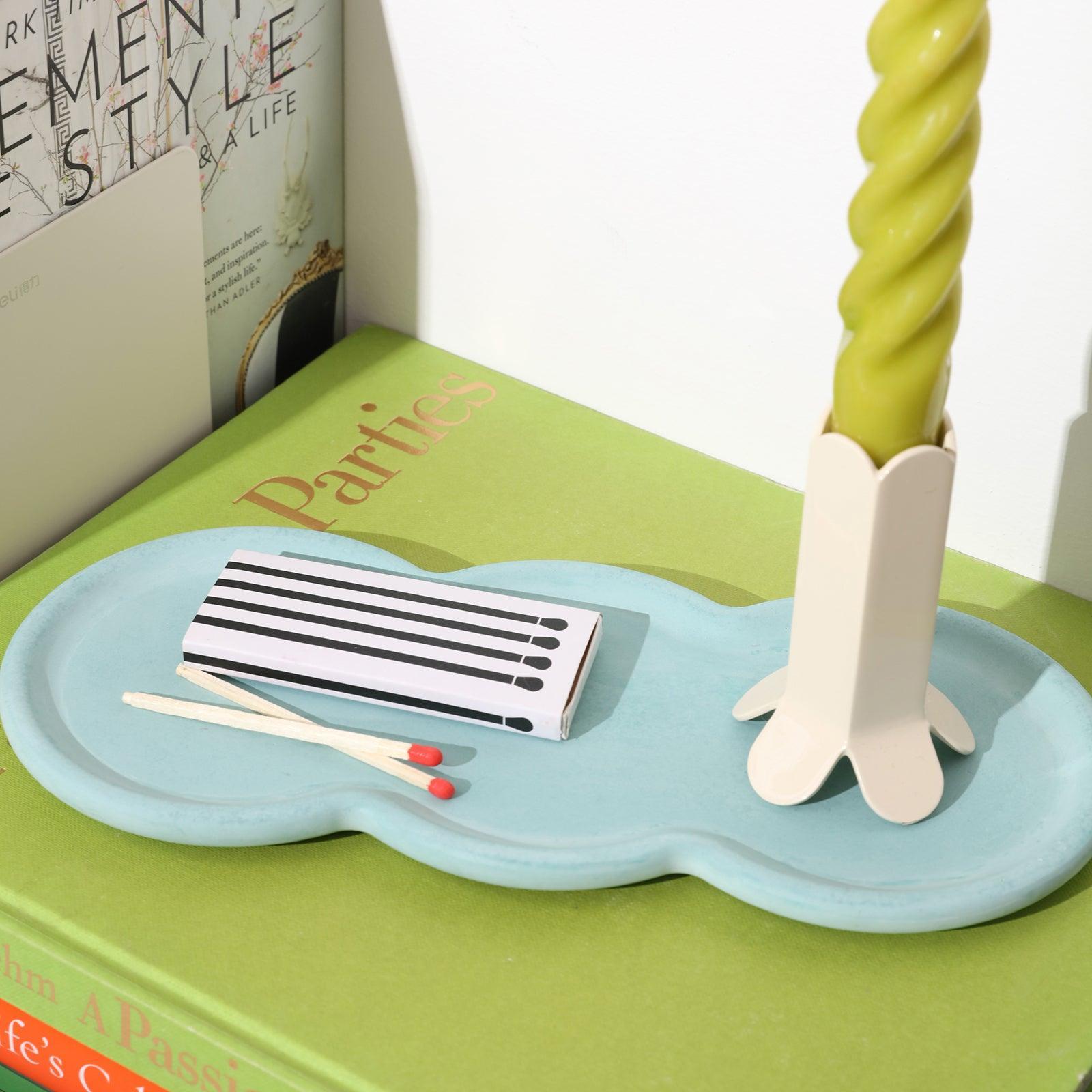 Triple-Nut Peanut-Shaped Tray with matches and green tapered candle in candlestick - Boowan Nicole