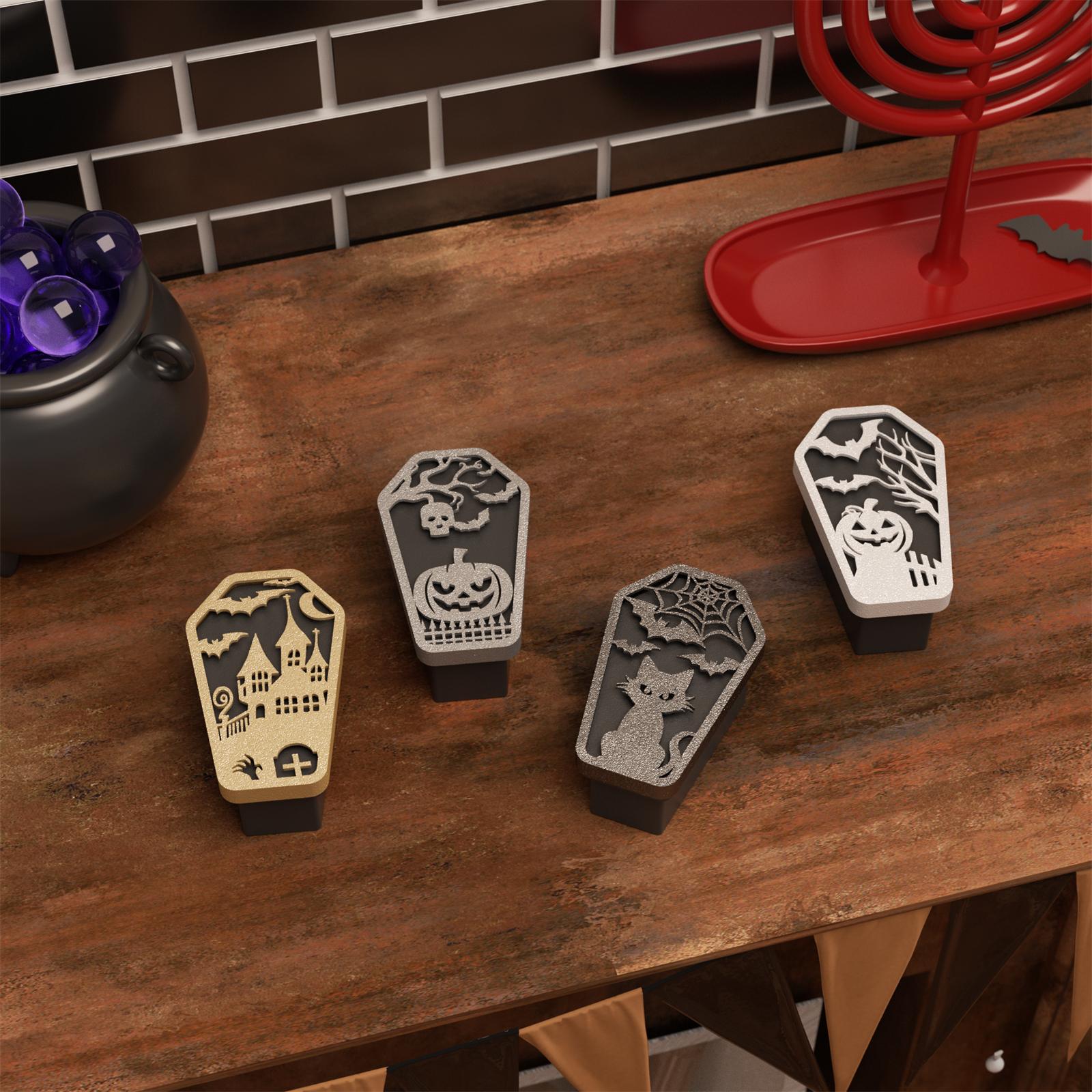 Halloween coffin candle jars with detailed spooky lid designs on a wooden table -  Boowan Nicole