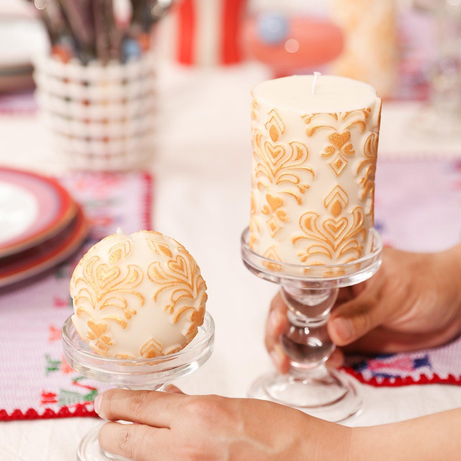 Ball and pillar relief pattern candles arranged on a candle holder, adding a unique touch.