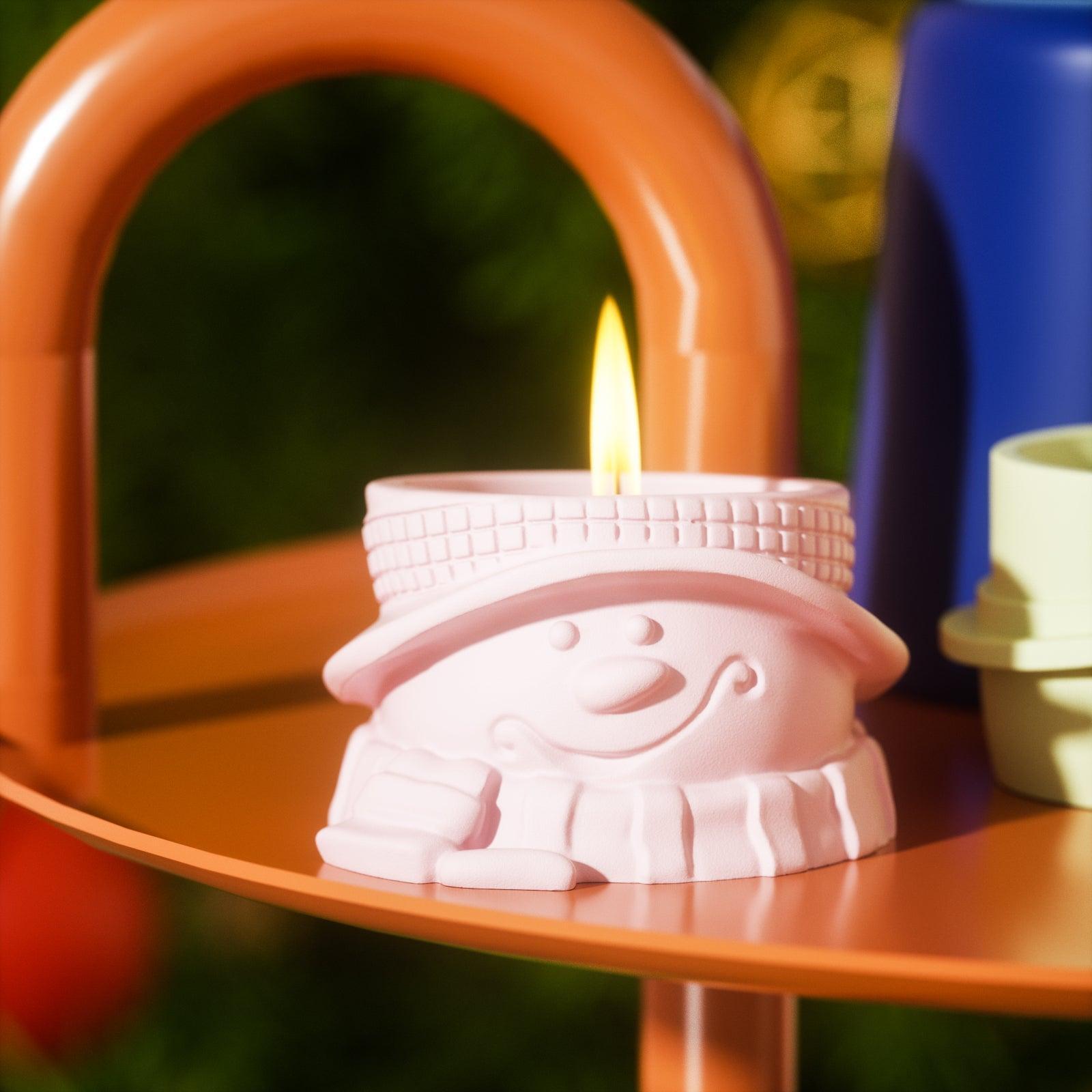 Pink Wearing Scarf Christmas Snowman Tea Light Candle in Candle Holder is slowly burning -Boowan Nicole