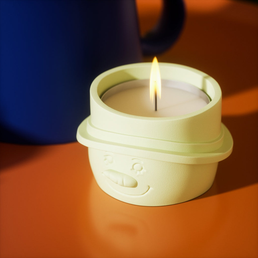 Candles burning slowly in yellow Christmas snowman tea light candle holder - Boowan Nicole