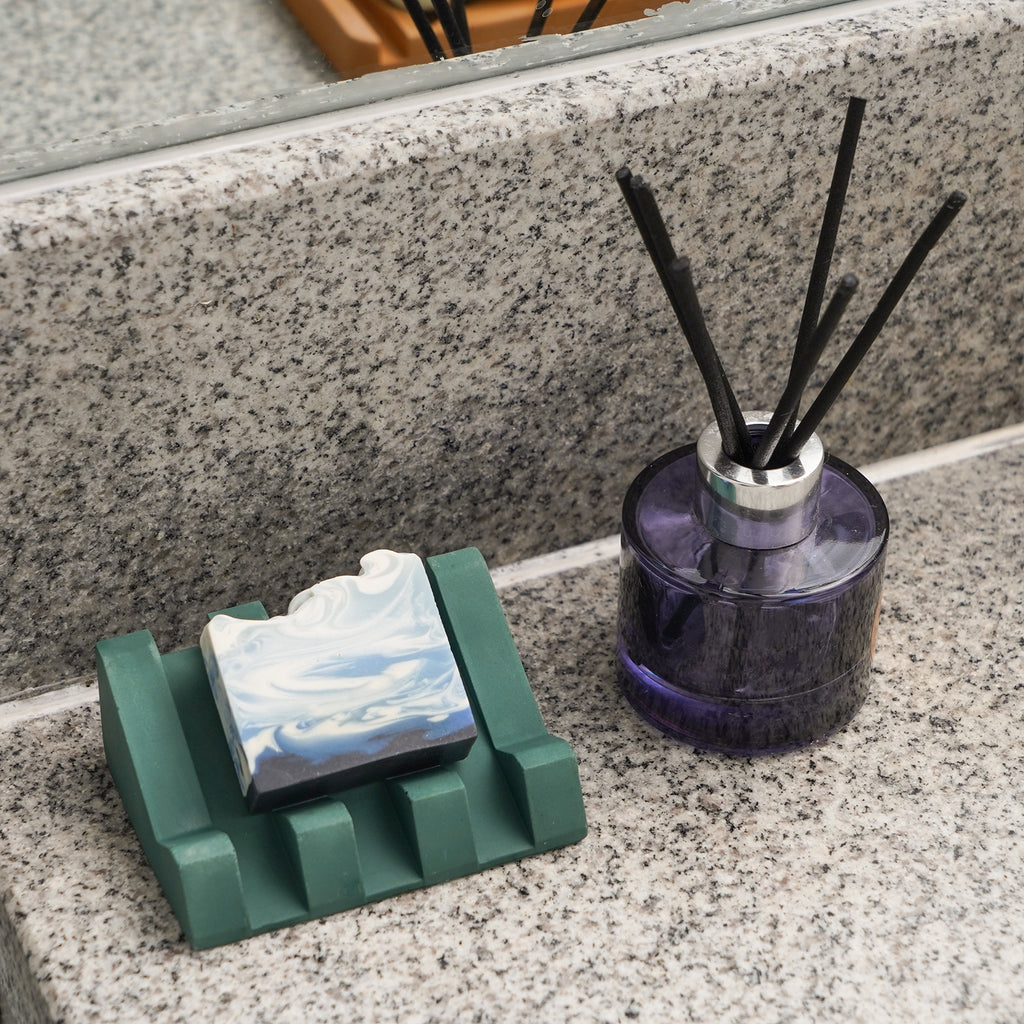 Elevate your sink area – a soap dish placed beside the washbasin, adding a touch of style and functionality to your daily routine.