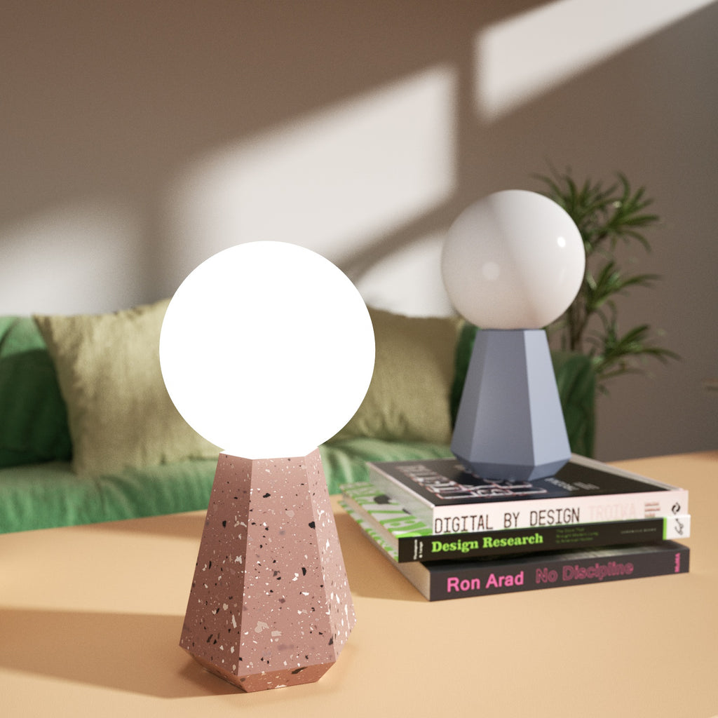 The Diamond-Shaped Table Lamp made of brown terrazzo is placed on the tabletop-Boowan Nicole