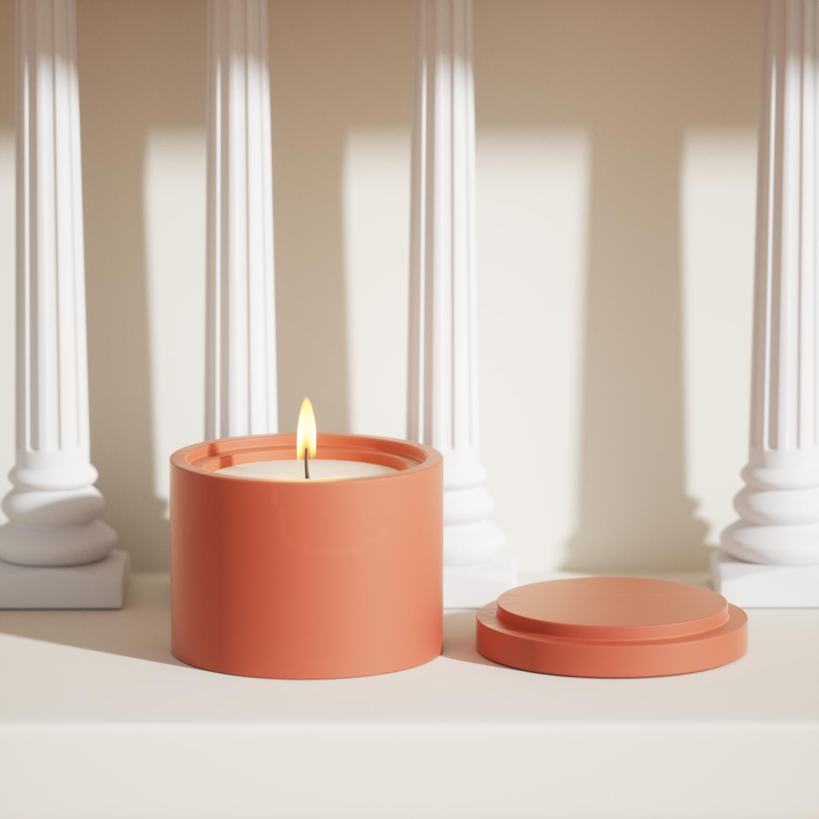 Brown candle jar's burning candle serves as a home decor piece.