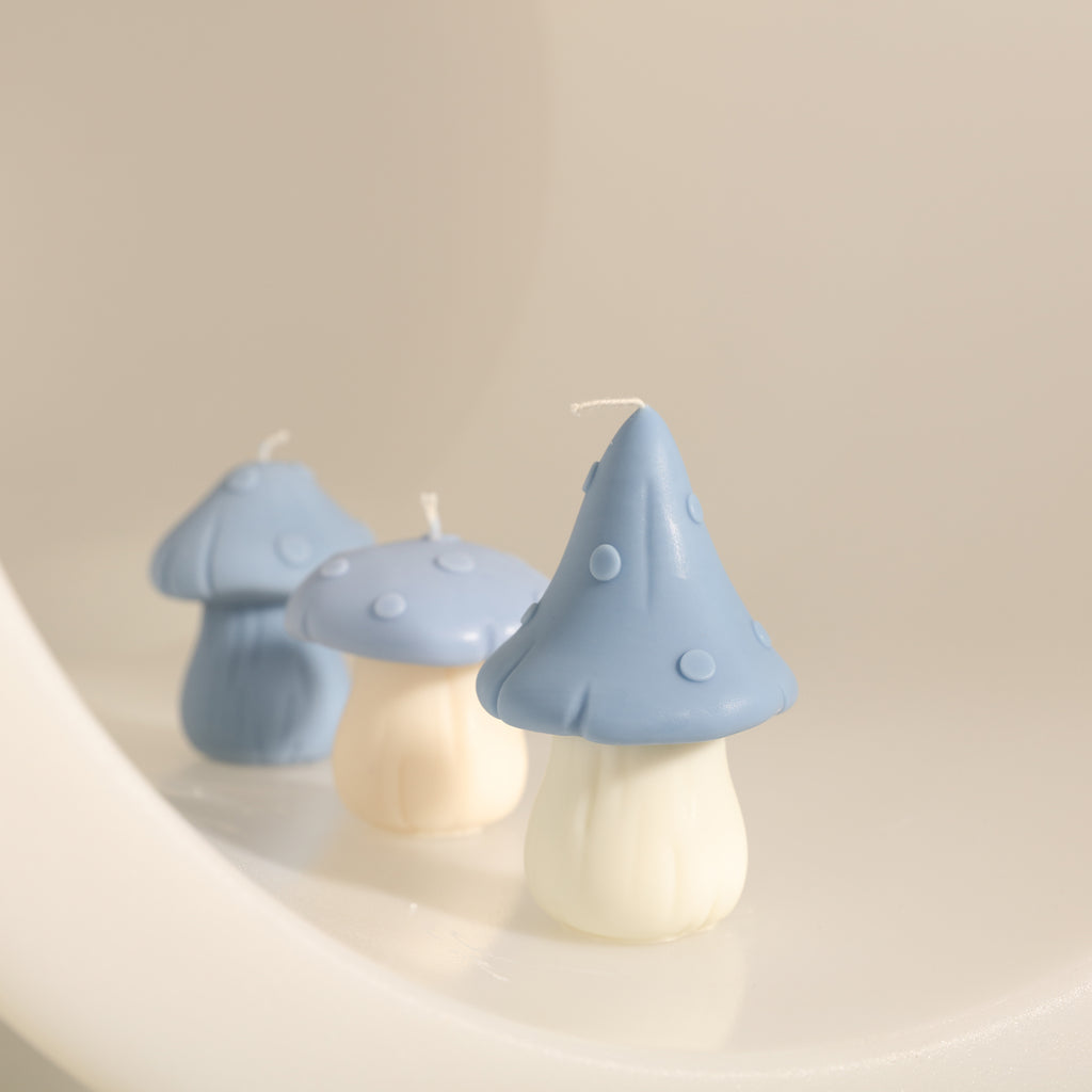 Blue mushroom shaped candle, designed by Boowan Nicole.