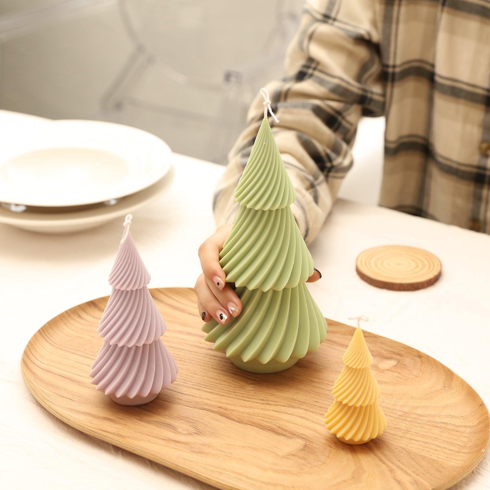 Arrange green evergreen Christmas tree candles in wooden trays - Boowan Nicole.