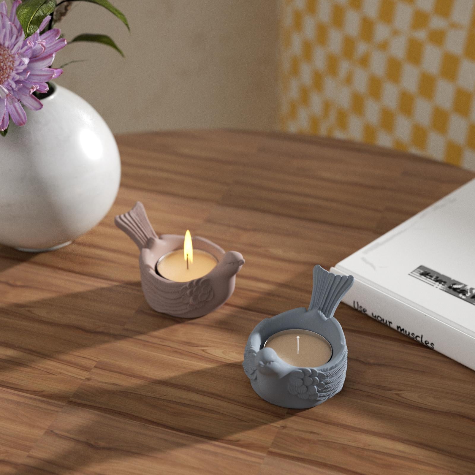 Lighting the candle inside a tealight candle holder on the table.