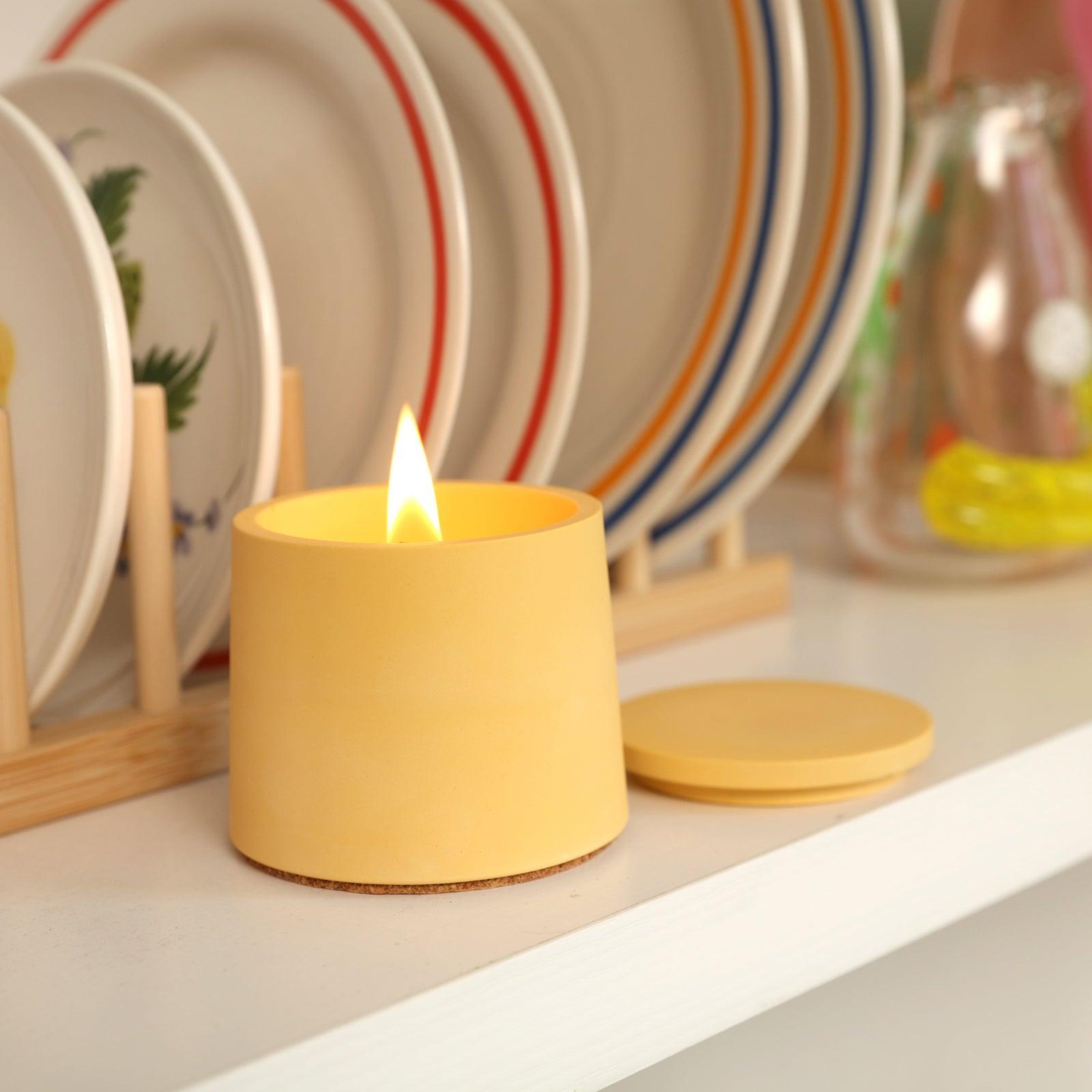 Candles burning slowly in yellow Simple Style Small Candle Jar on table - Boowan Nicole