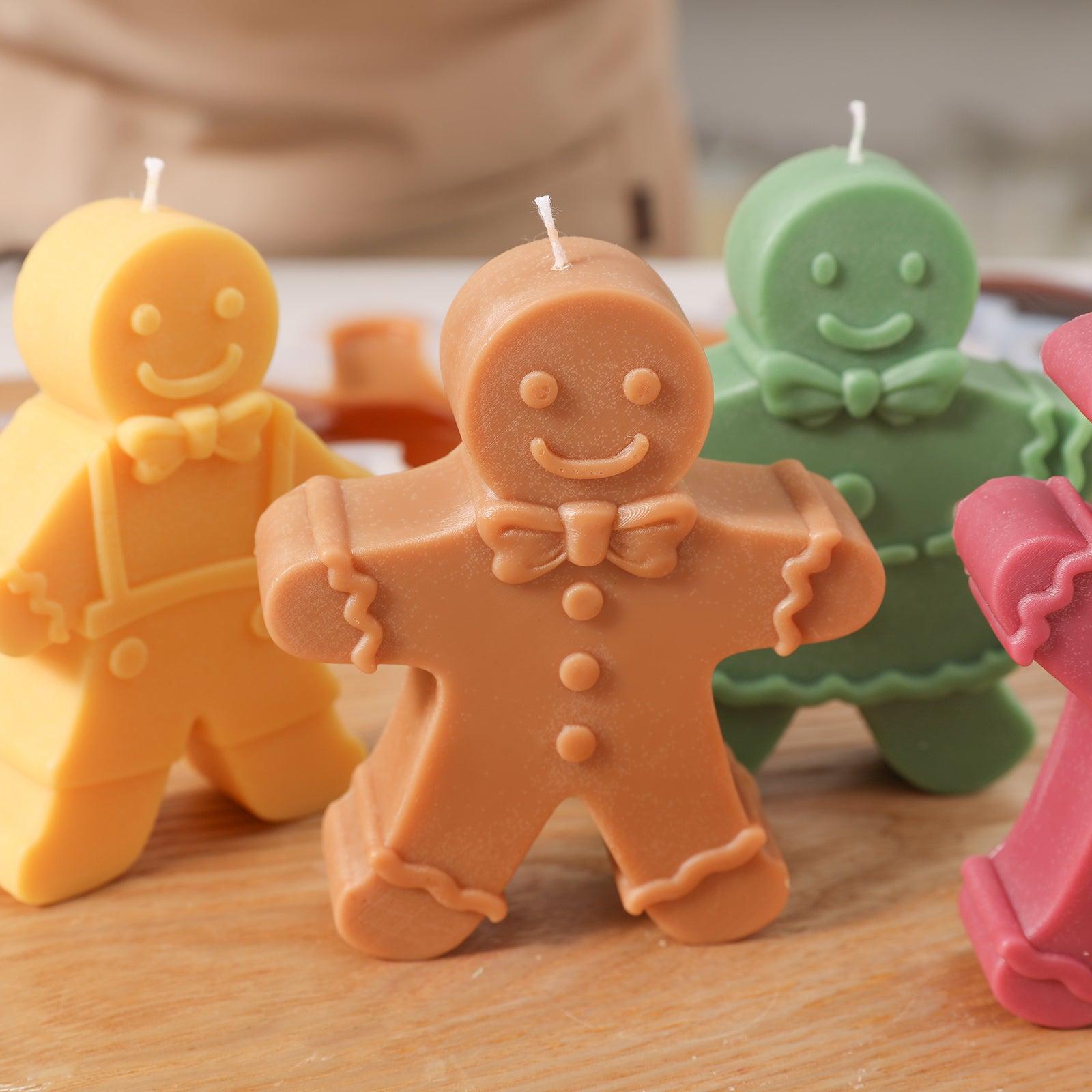 Brown, yellow and green Gingerbread Papa Candle placed in a tray on the table - Boowan Nicole
