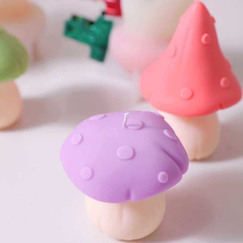 A close-up view of the toadstool-shaped mushroom candle shows the precision of the mold design, designed by Boowan Nicole.