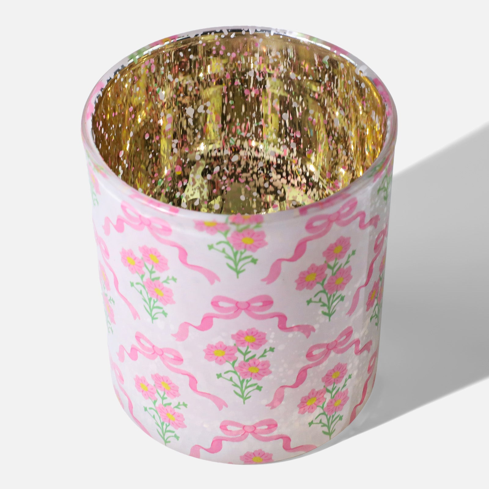 Top View of Frosted White Daisy Bow Glass Candle Cup With Speckled Gold Interior and Allover Pink Floral Ribbon Print - Boowan Nicole