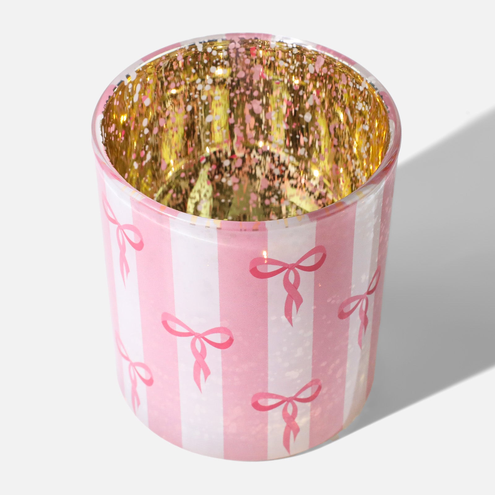 Macro Close-up of Vivid Red Hand-drawn Bow Motif on Semi-Opaque Frosted Pink Stripe Candle Glass - Boowan Nicole