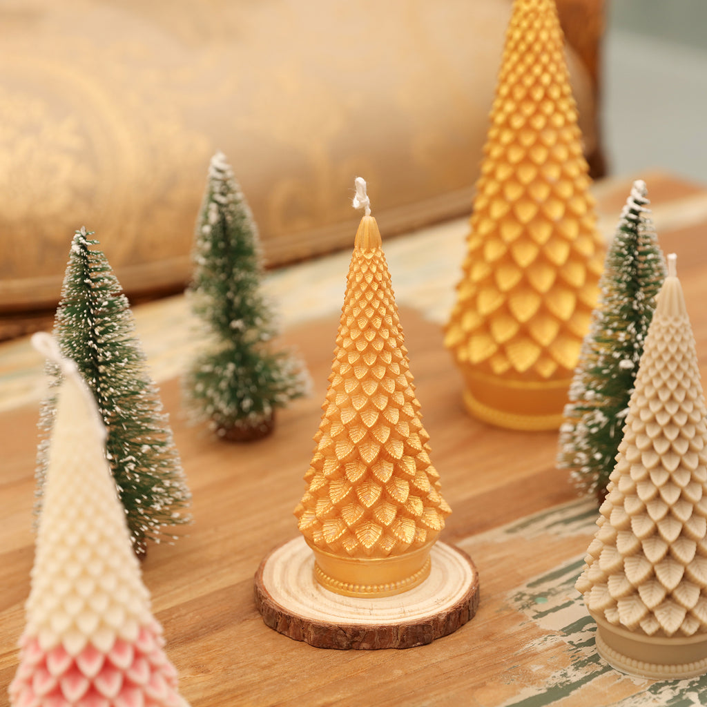 Gold Christmas tree candles in a wooden tray—Boowan Nicole