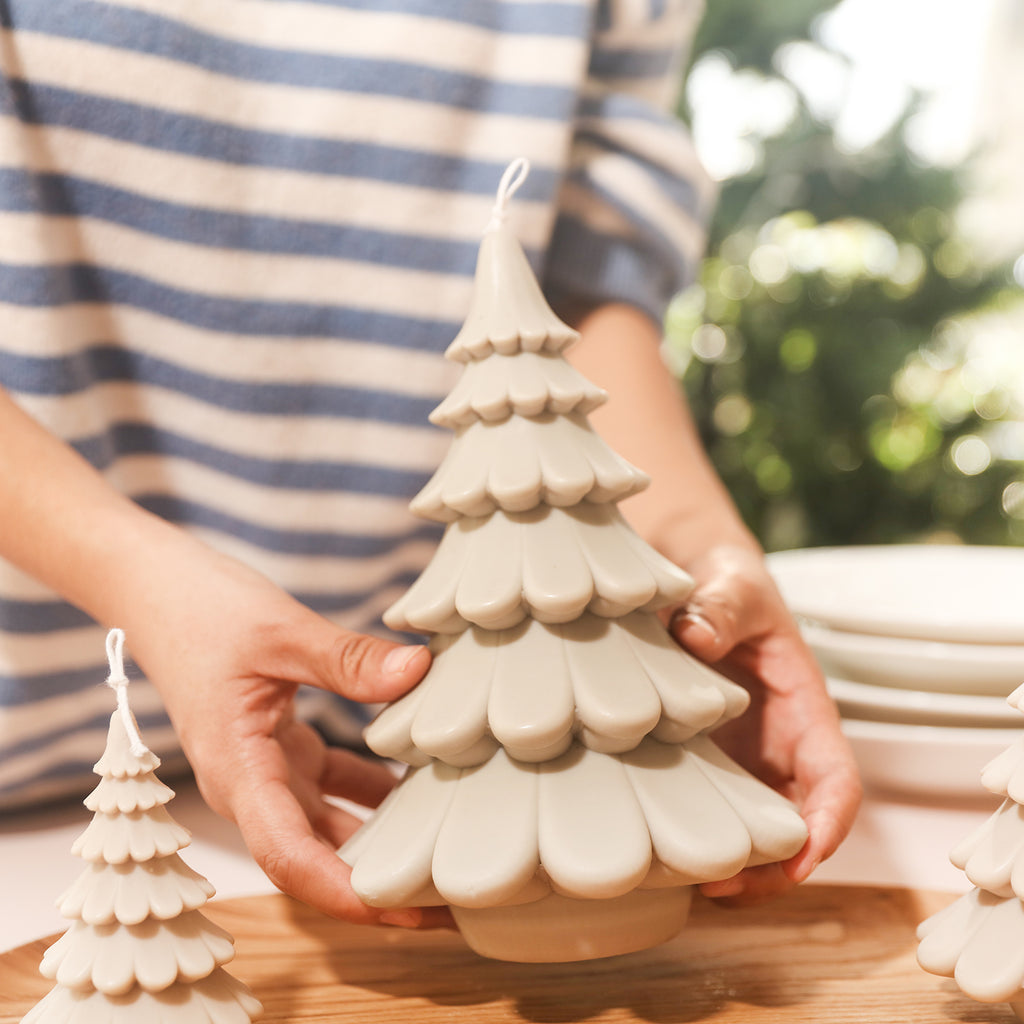 Arrange the 8.5-inch tiered Christmas tree candles in a tray, designed by Boowan Nicole.