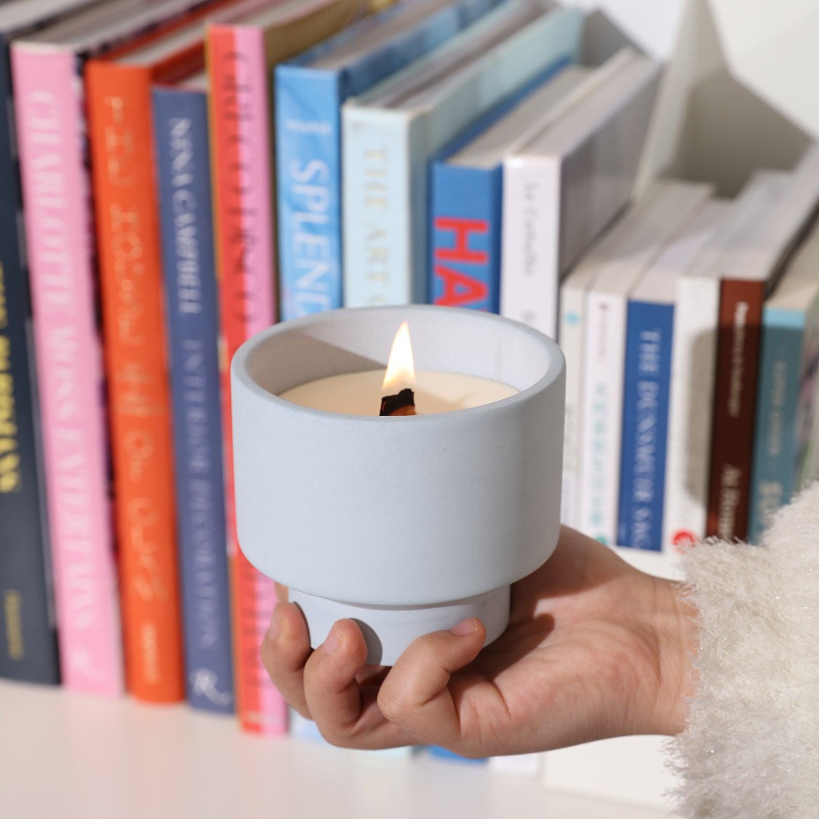 Bowl-shaped candle jar on hand