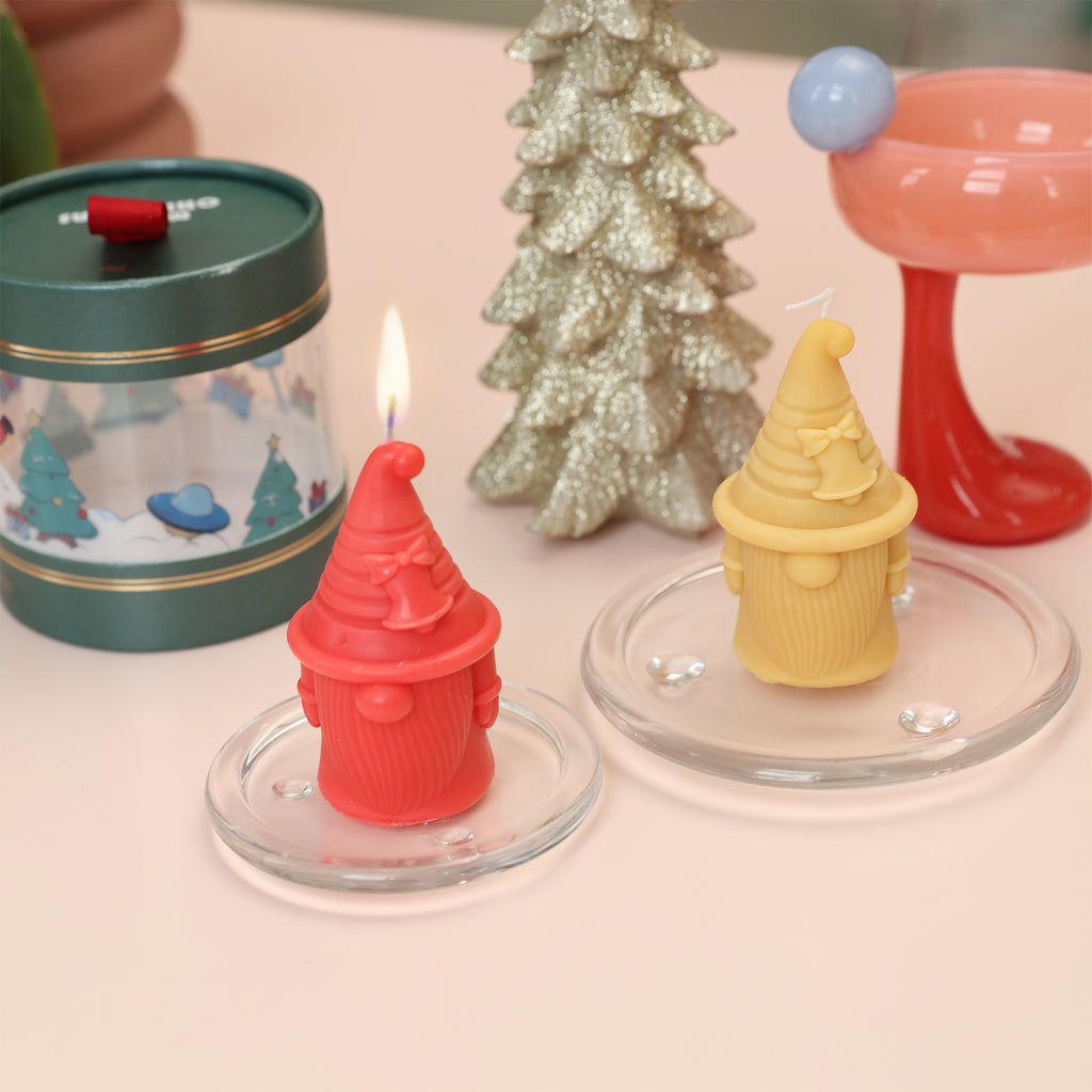 Red Bell of Hat-tactic Gnome Squad Candle Slowly Burning in a Glass Tray - Boowan Nicole