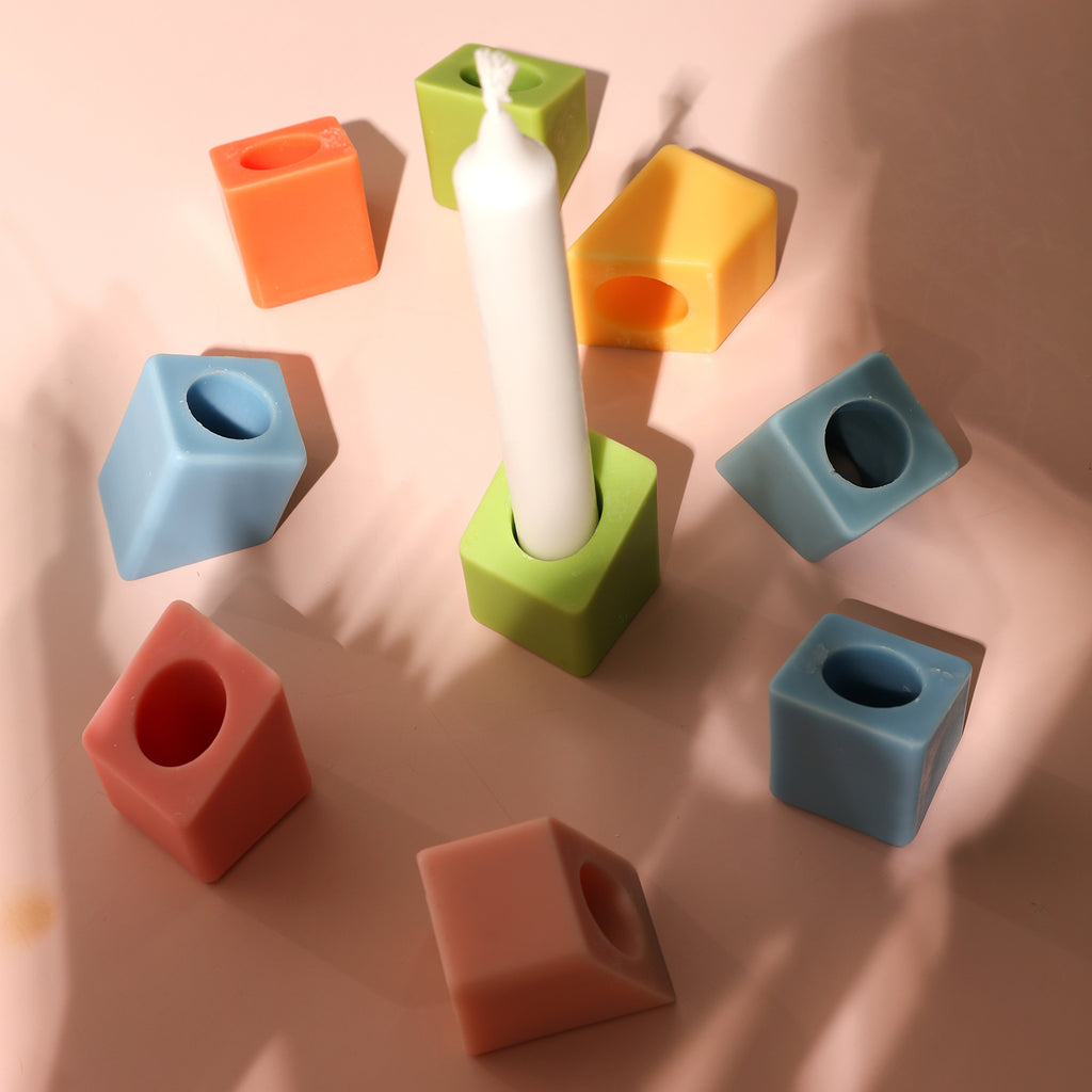 Different colors of Cube shape and white Candle -Boowan Nicole