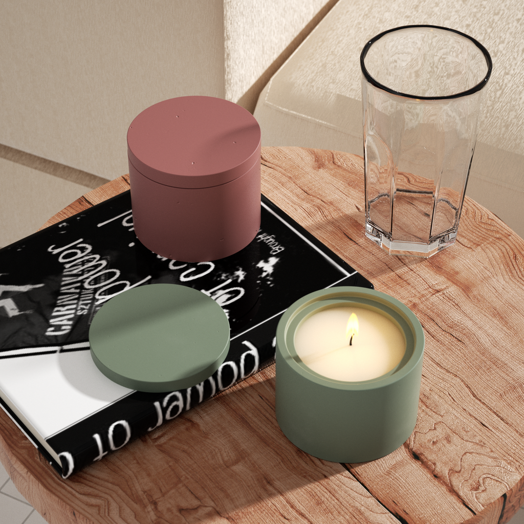 Candle in the green jar creates a serene atmosphere.