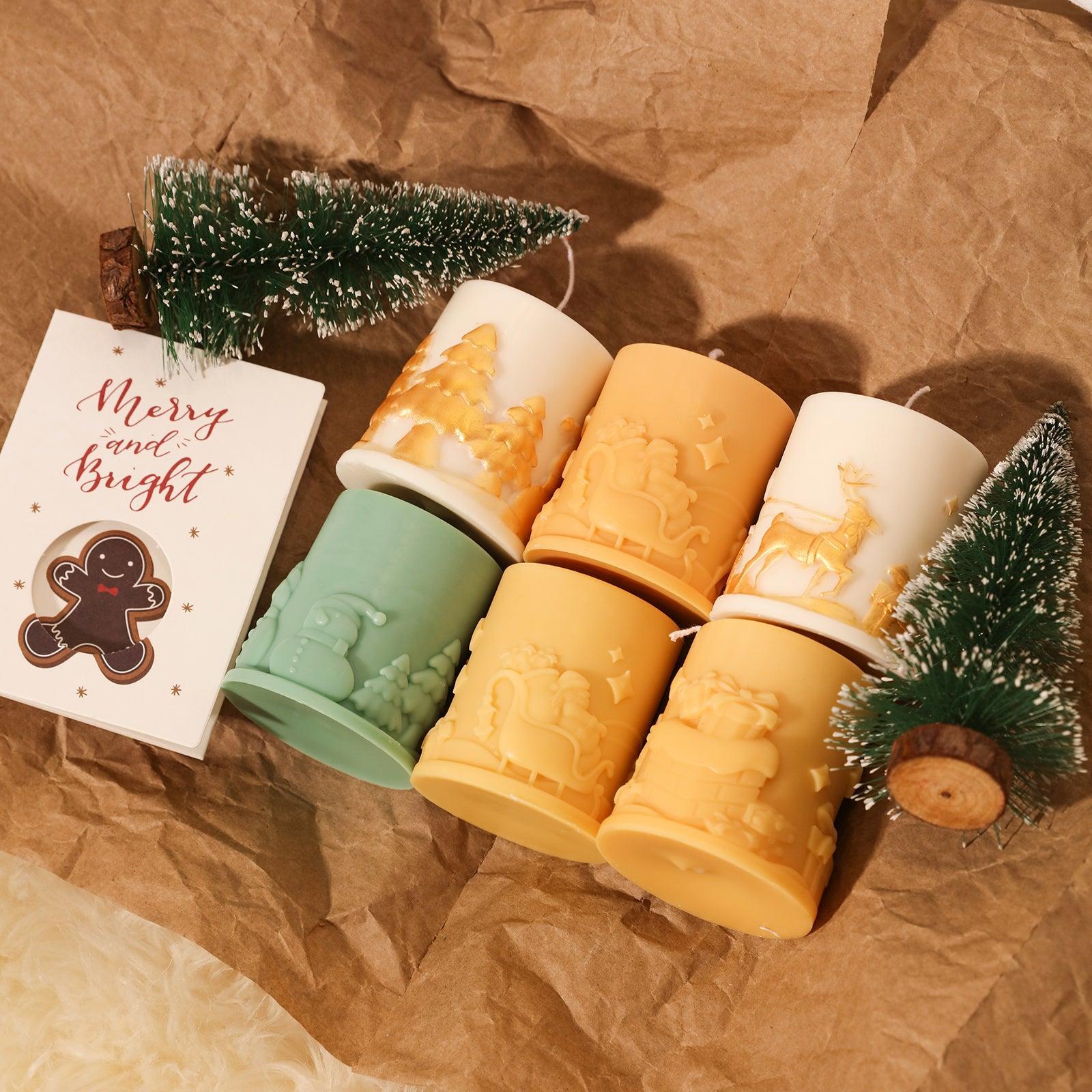 Six Christmas embossed pillar candles arranged on cushions - Boowan Nicole