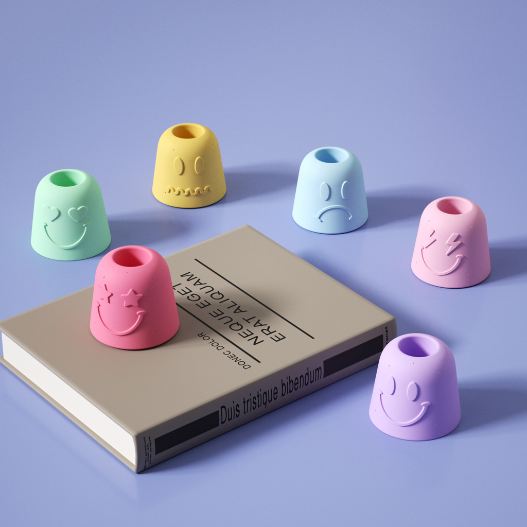 Bell-shaped Emotion Pen & Toothbrush, Holder-Boowan Nicole in various colors and expressions next to a book