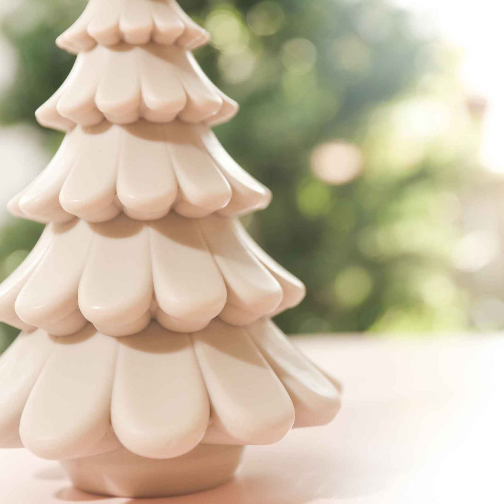 Close up shot of layered Christmas tree candles, the finest details created to create the best work, designed by Boowan Nicole.