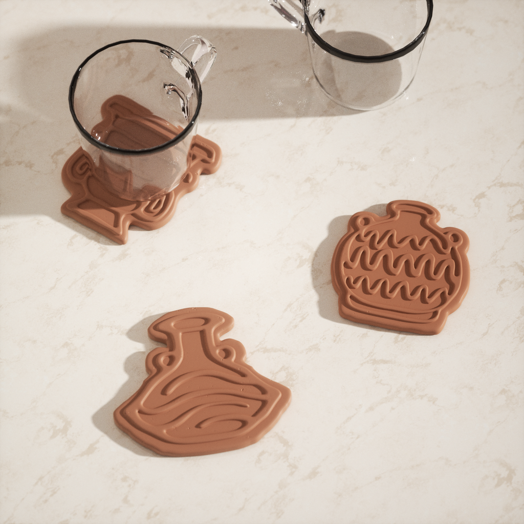 Brown coasters with three different designs, designed by Boowan Nicole.