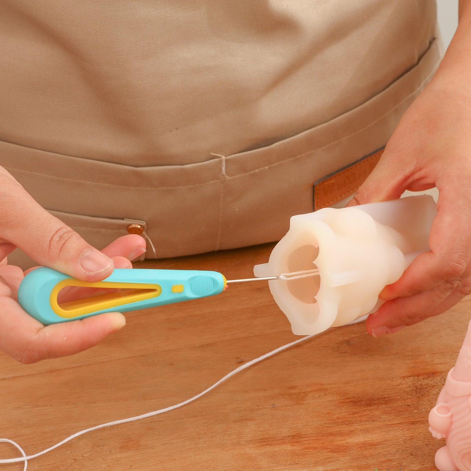 It’s very easy to thread candle wicks using a stringing tool