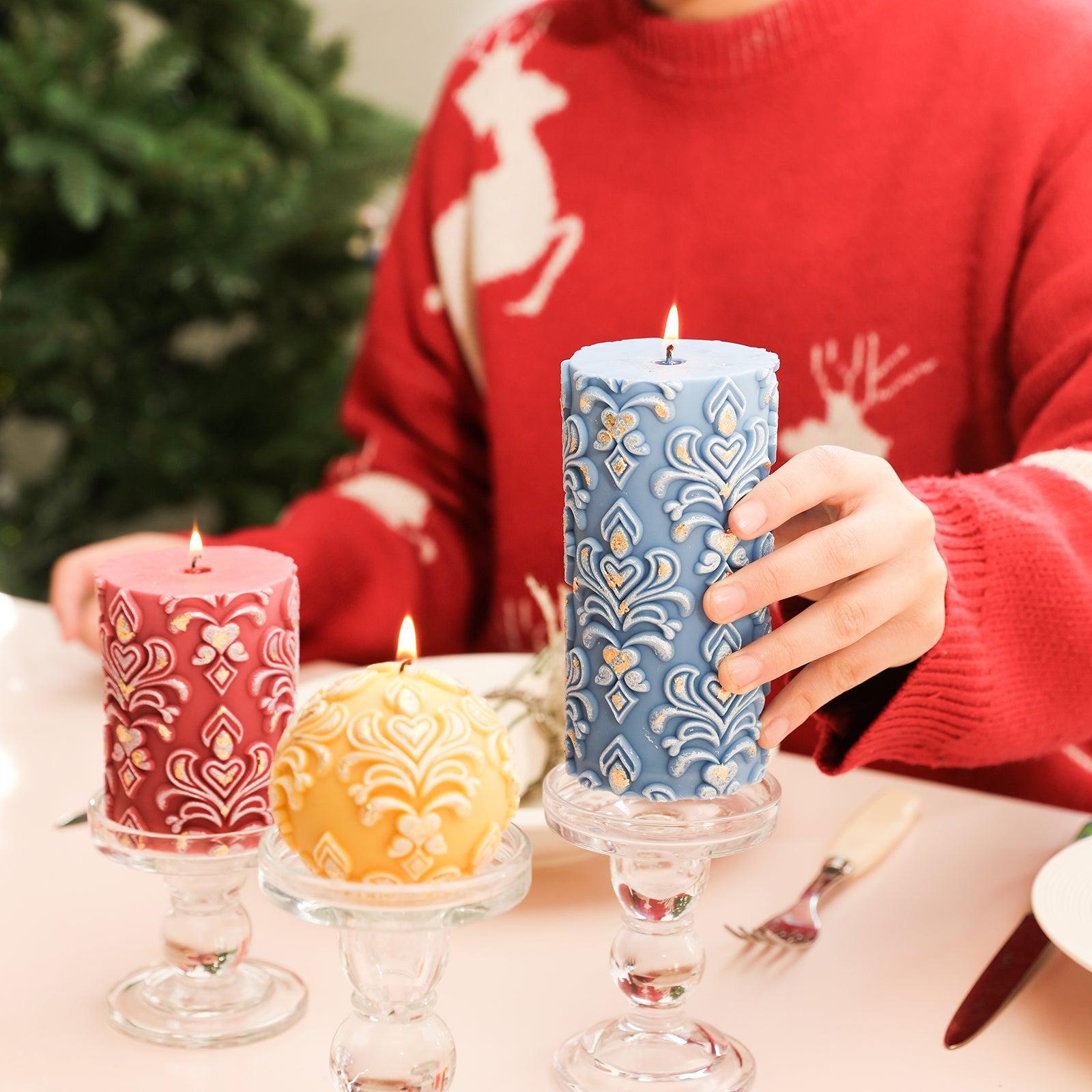  Unique arrangement of sphere, short pillar, and long pillar-shaped relief candles on a candle holder.