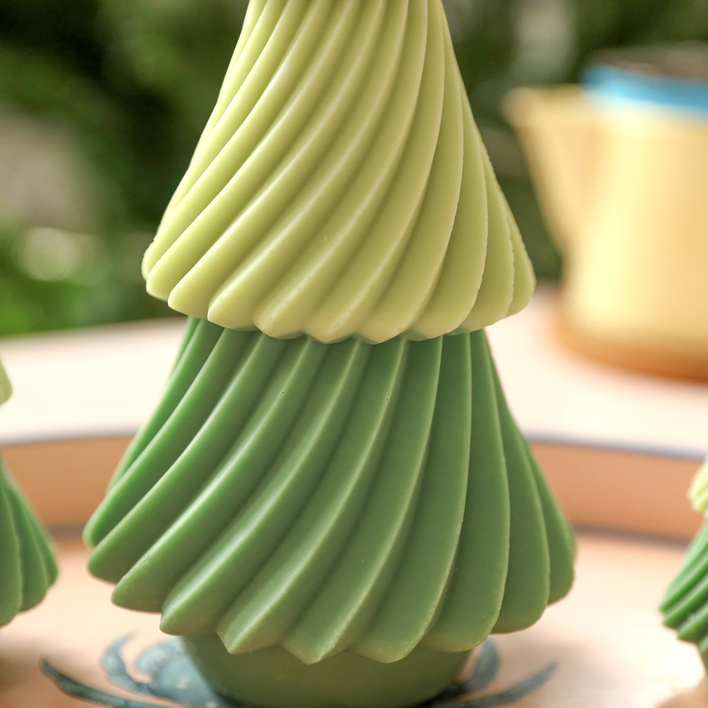 Detailed shot of evergreen Christmas tree candles, outstanding works come from exquisite design--Boowan Nicole