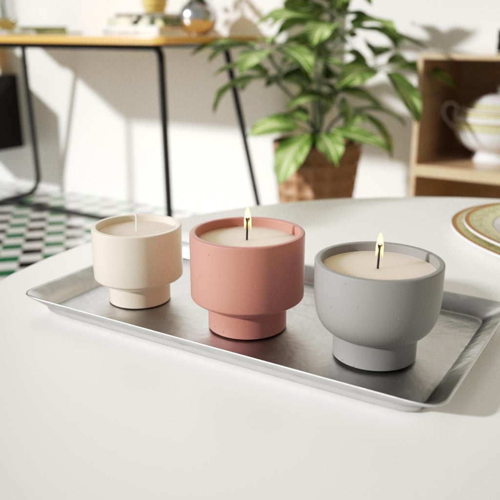 The candles in three Concrete Plant Pots of different colors and shapes are burning slowly, expanding different usage scenarios and functions -Boowan Nicole