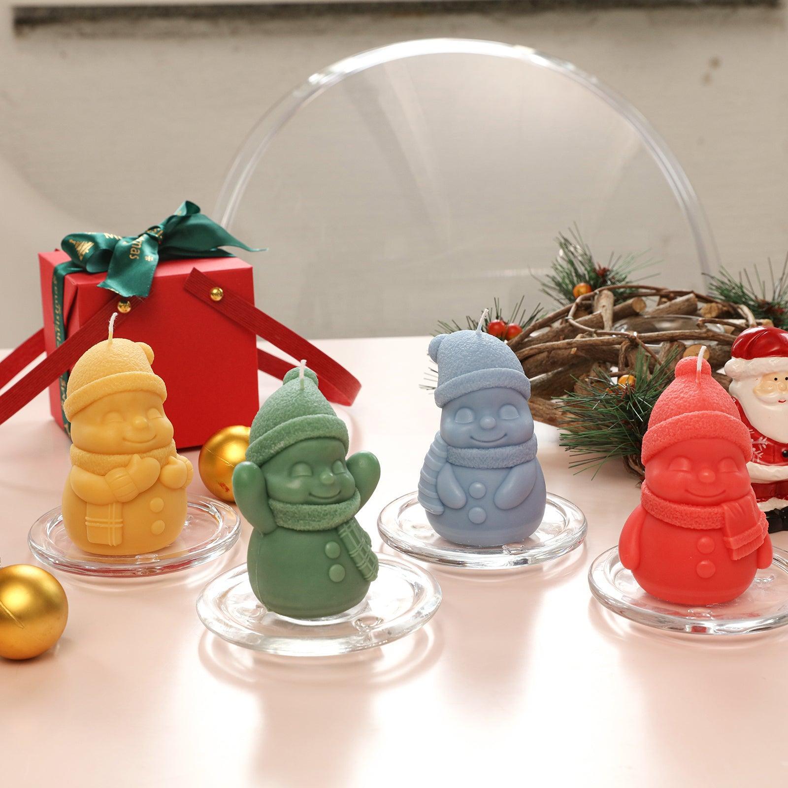 Snowy Friend Candles of different colors and shapes are placed on the table-Boowan Nicole