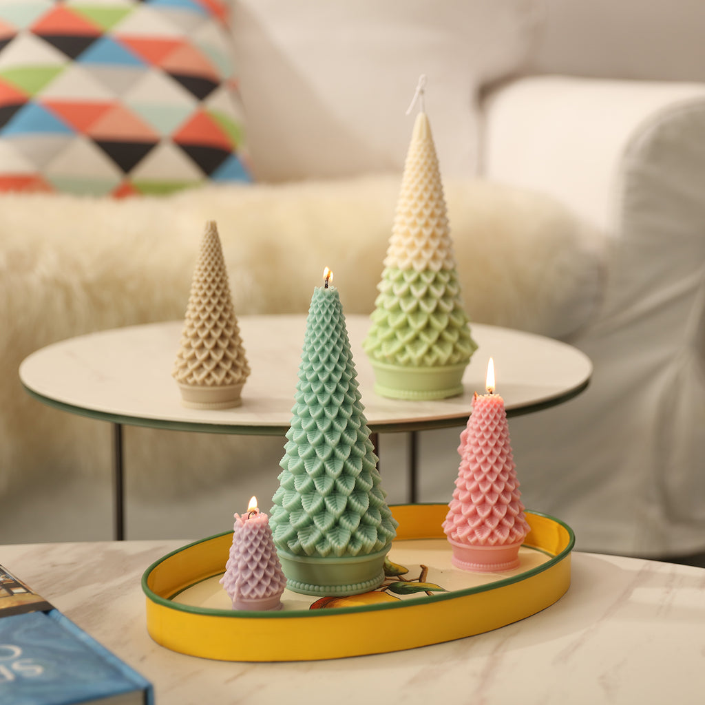 Tapered Christmas tree candles of different sizes placed on a high and a low coffee table-Boowan Nicole
