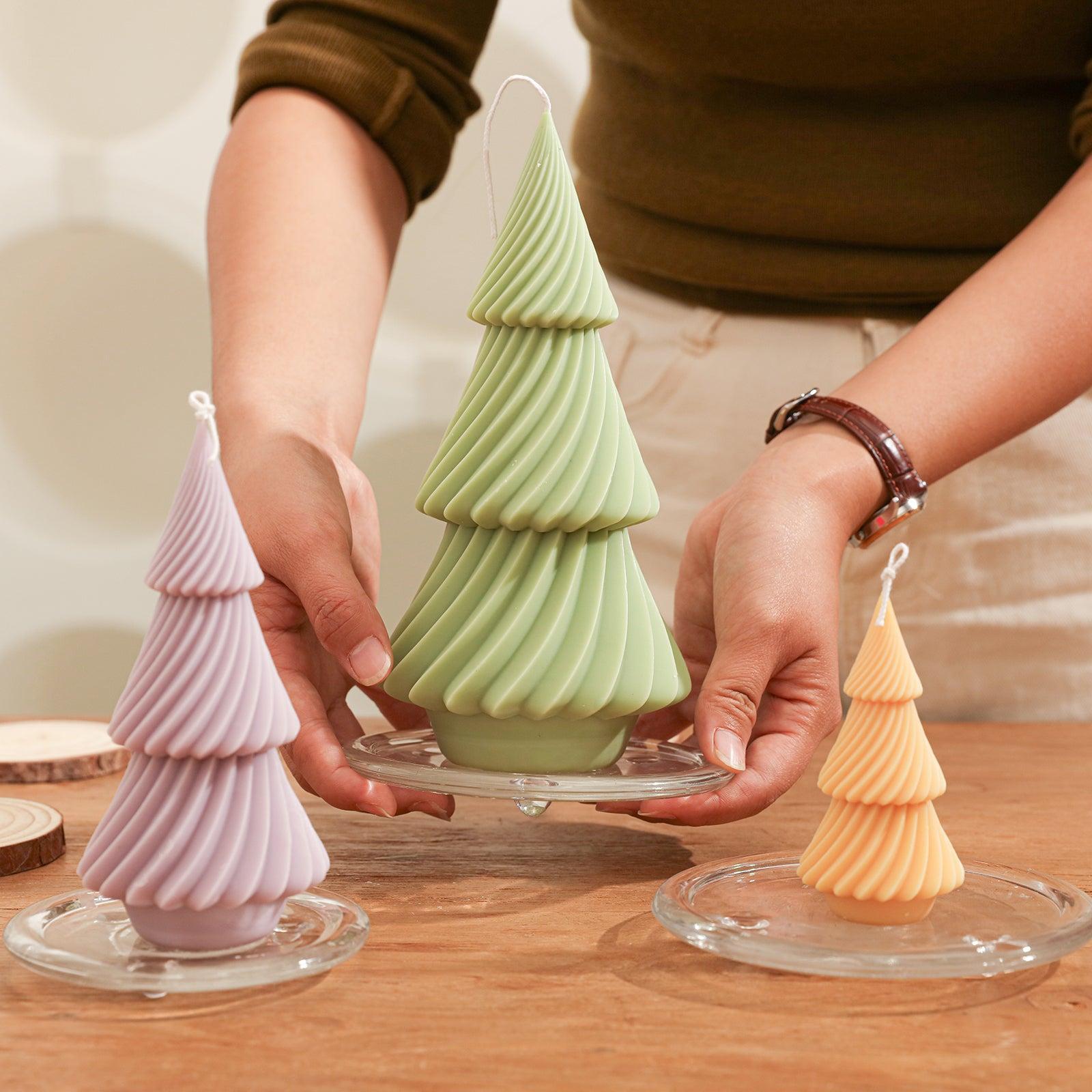 Place the crystal tray with the green evergreen Christmas tree candles on the table - Boowan Nicole