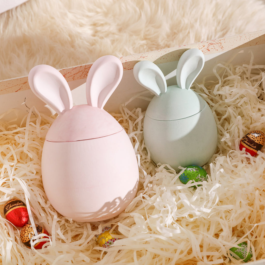 Two Easter Bunny candle jars in a gift box