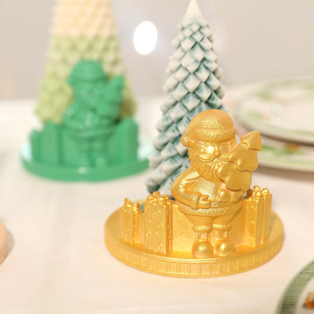 Gold Santa candle holder with blue Christmas tree candles, designed by Boowan Nicole.