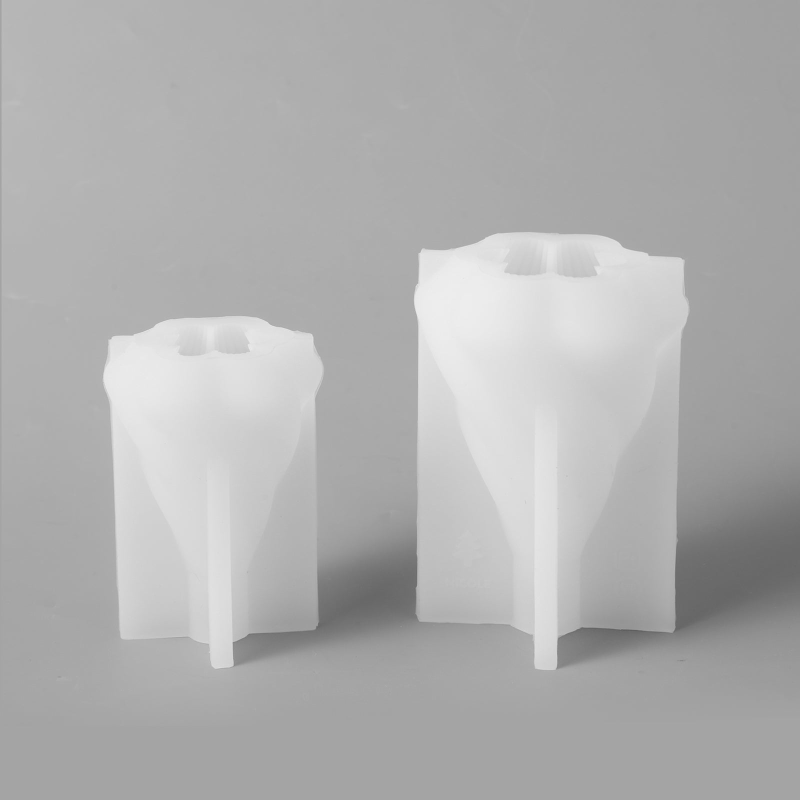 Two white silicone molds for making Spiral Christmas Tree Candle - Boowan Nicole