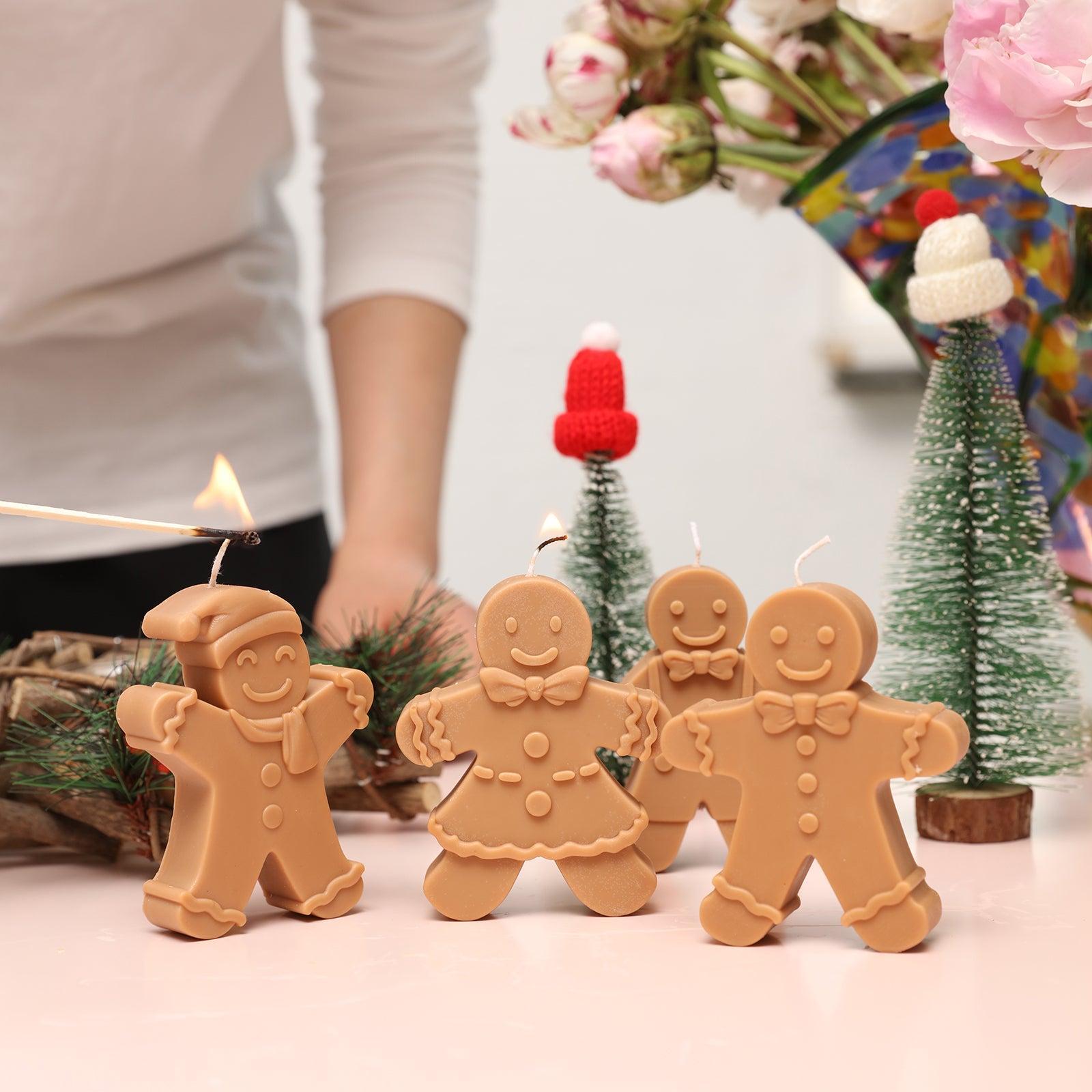 Brown Gingerbread Kid candle-Boowan Nicole lit on the table