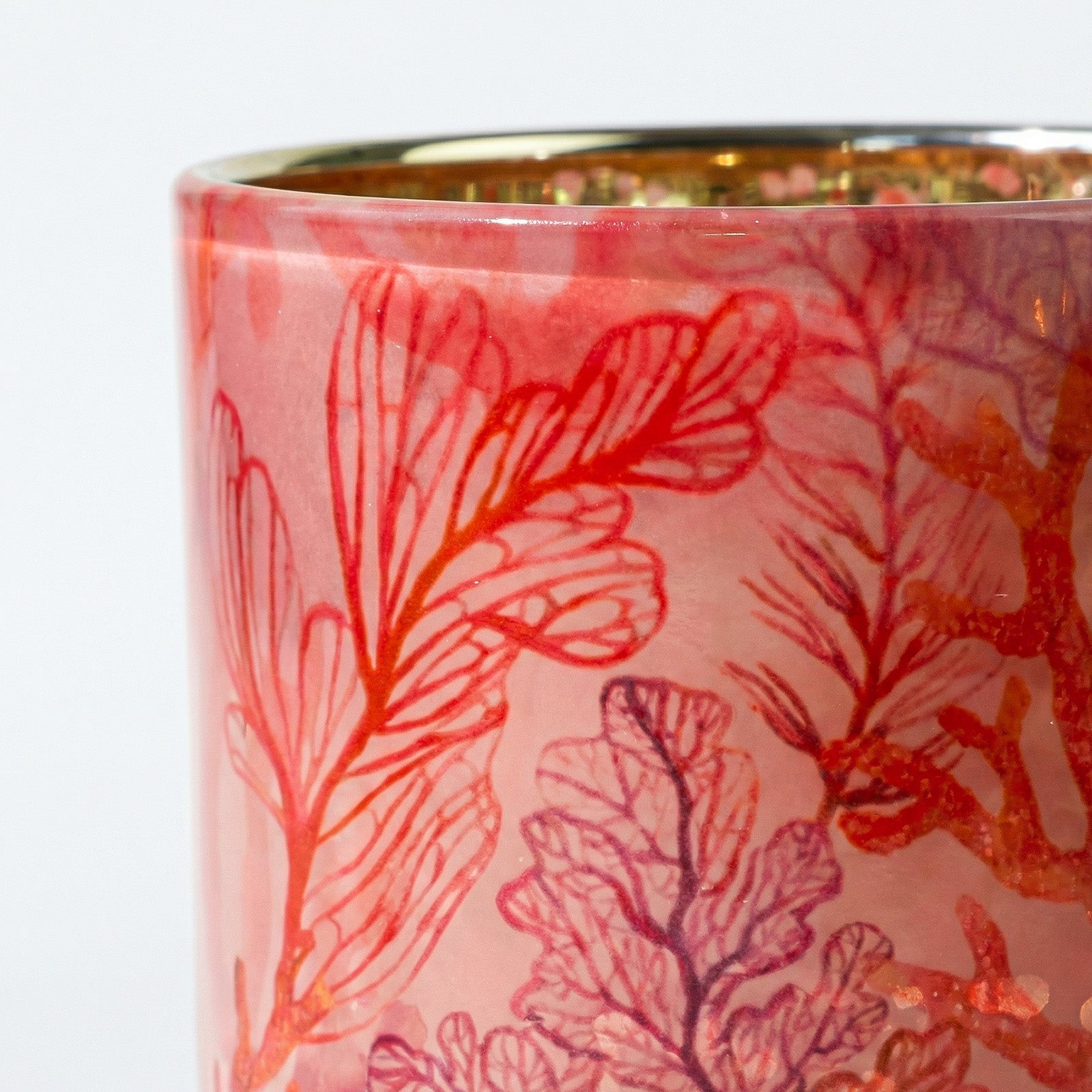 Macro Close-up of Detailed Red & Purple Coral Leaf Pattern on Frosted Candle Glass Surface - Boowan Nicole