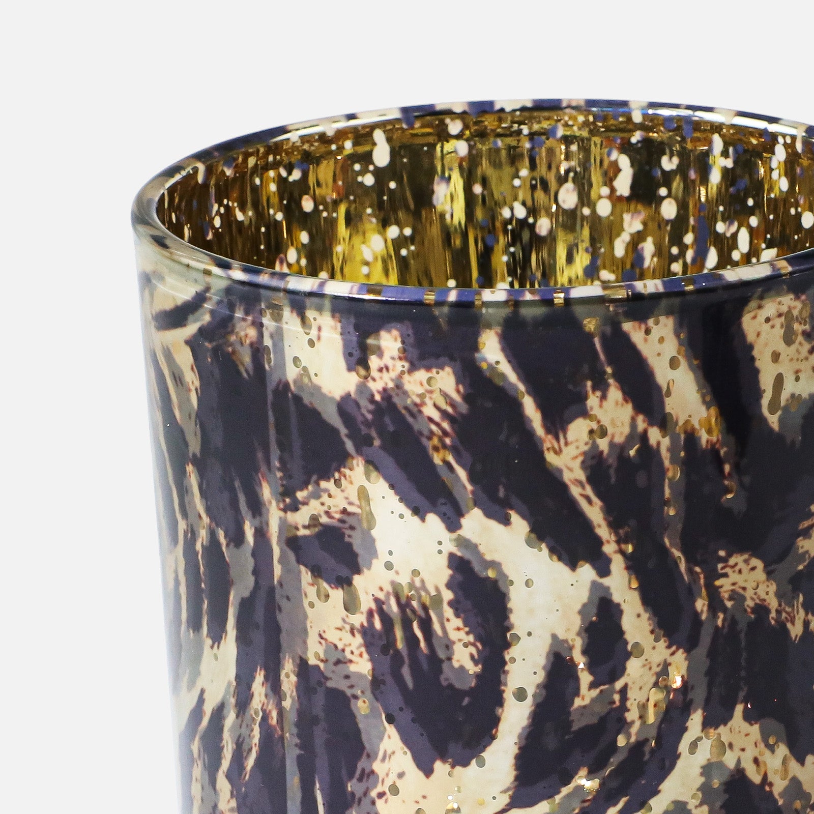 Macro Close-up of Irregular Black Blot Leopard Print Over Gold Speckle Base on Gloss Candle Glass Surface - Boowan Nicole