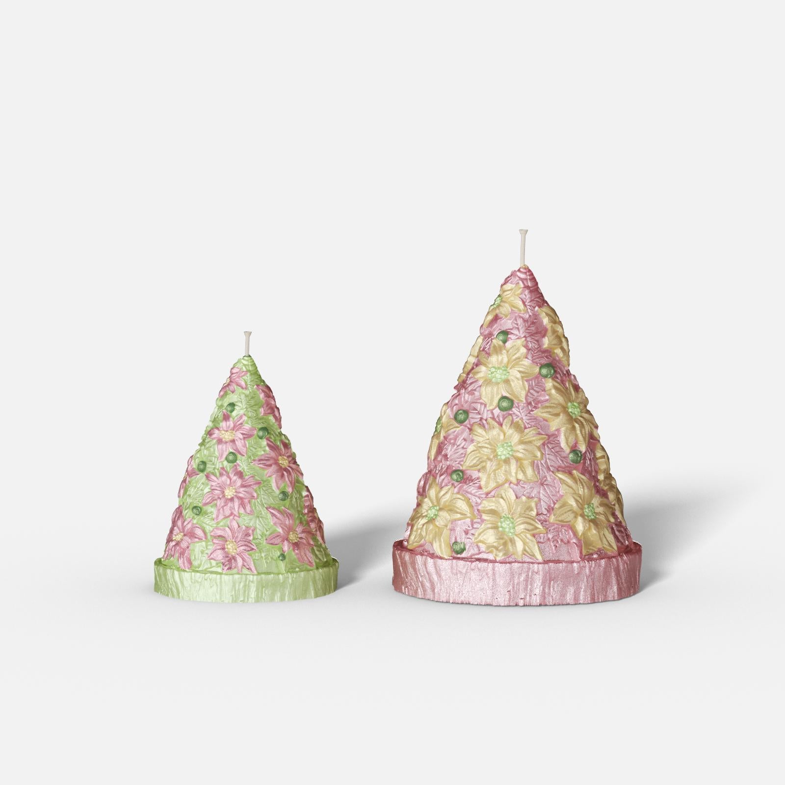 Two floral-patterned cone-shaped candles