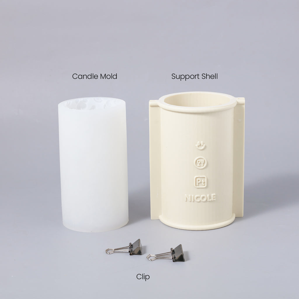 Candle-making kit includes clips, a plastic support shell, and a silicone mold, providing all essentials.