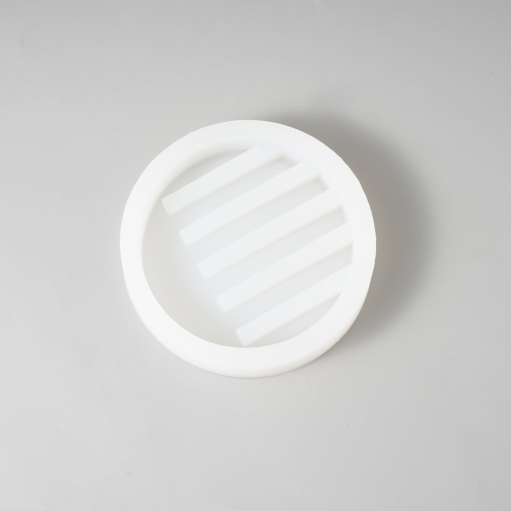 White silicone mold, embodying boowannicole's simplicity and purity, providing an excellent tool for soap dish crafting.