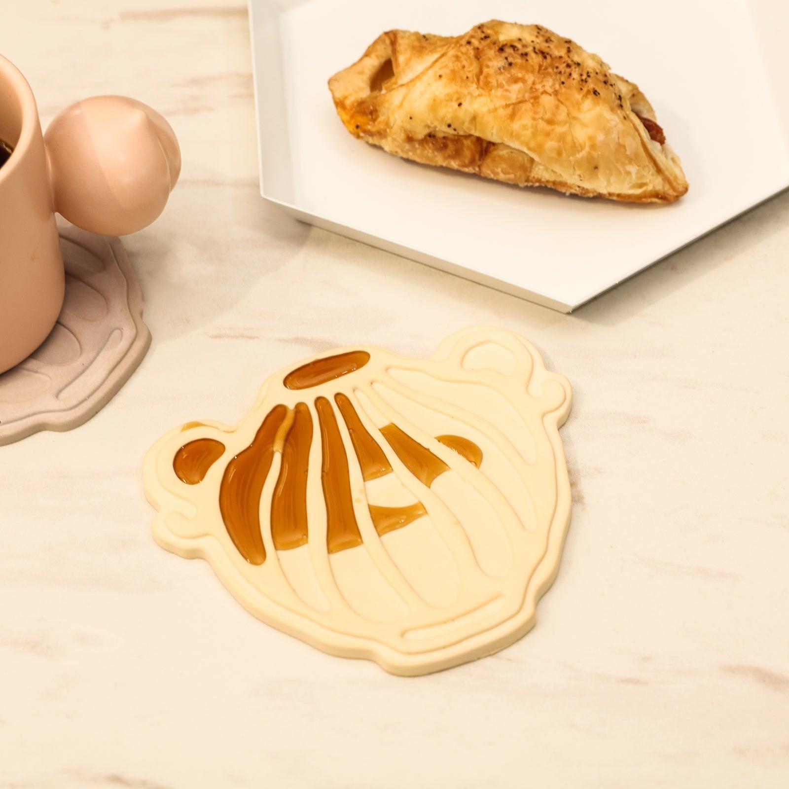 Prevent breakfast coffee from spilling on your desk, designed by Boowan Nicole.