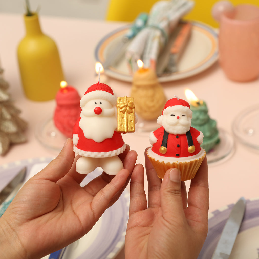 Hands-on display of Santa Claus Cupcake Candle and gift-giving Santa Claus Candle-Boowan Nicole