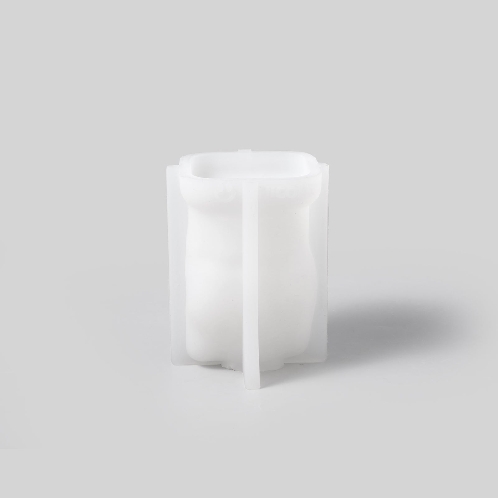 White candle silicone mold by Boowan Nicole.