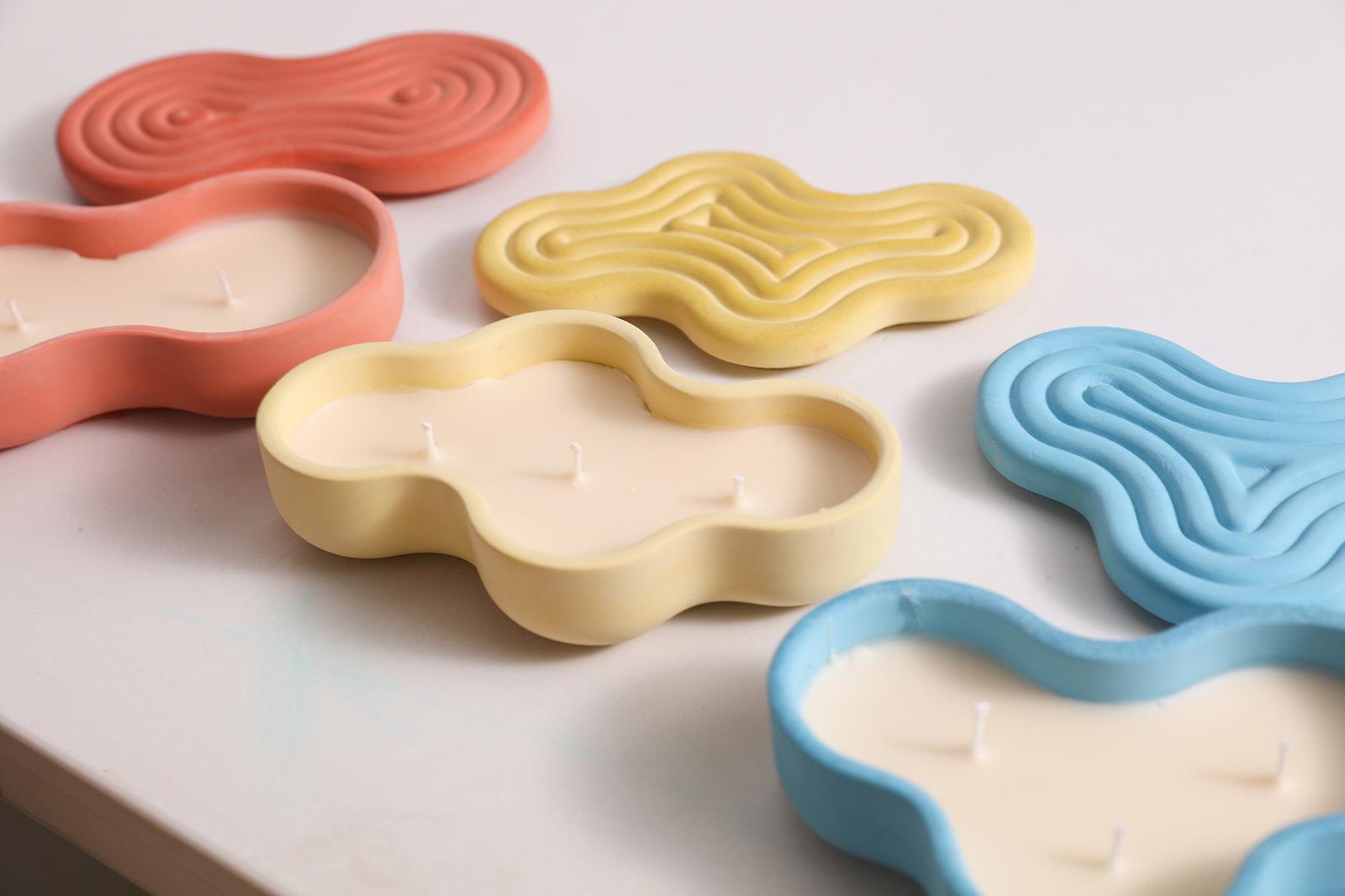 Three different styles of wriggle candle jars in red, yellow and blue-Boowan Nicole